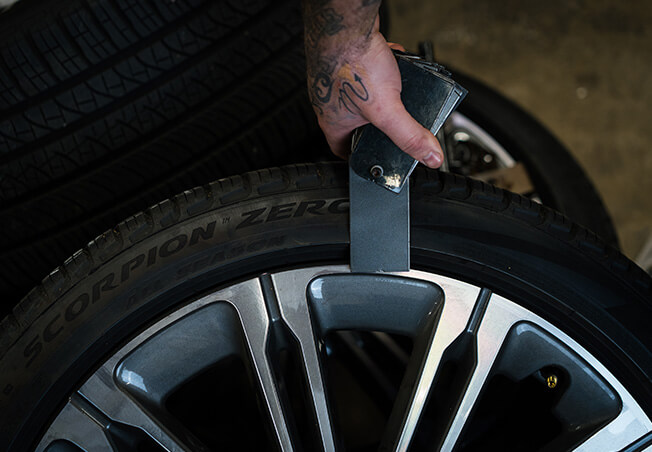 Alloy wheel being colour matched to one of the 150 colour cards Rolling Rims stock